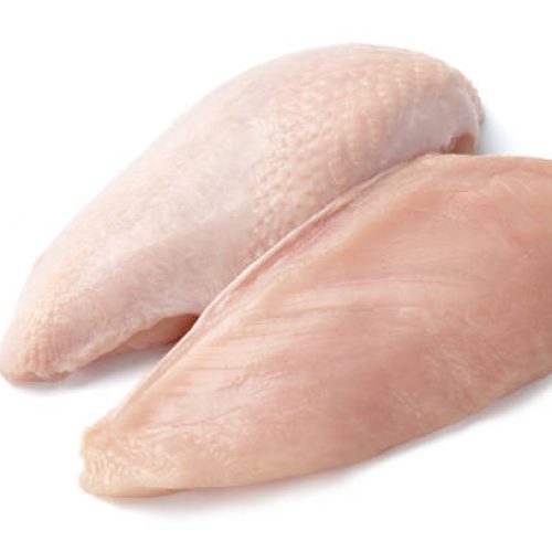 Raw chicken fillet with and without skin isolated on white background